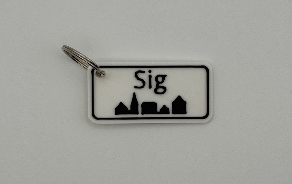 Personlig nøglering med bynavn