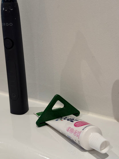 Toothpaste squeezer